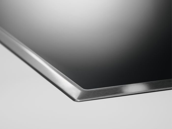 Встраиваемая варочная поверхность Electrolux EHF46547XK электрическая, 60 см, серебристая рамка, черный